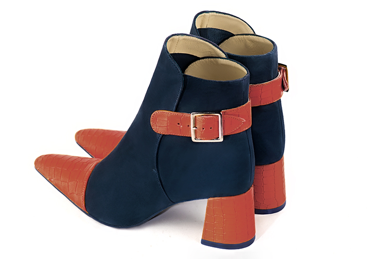 Terracotta orange and navy blue women's ankle boots with buckles at the back. Tapered toe. Medium flare heels. Rear view - Florence KOOIJMAN